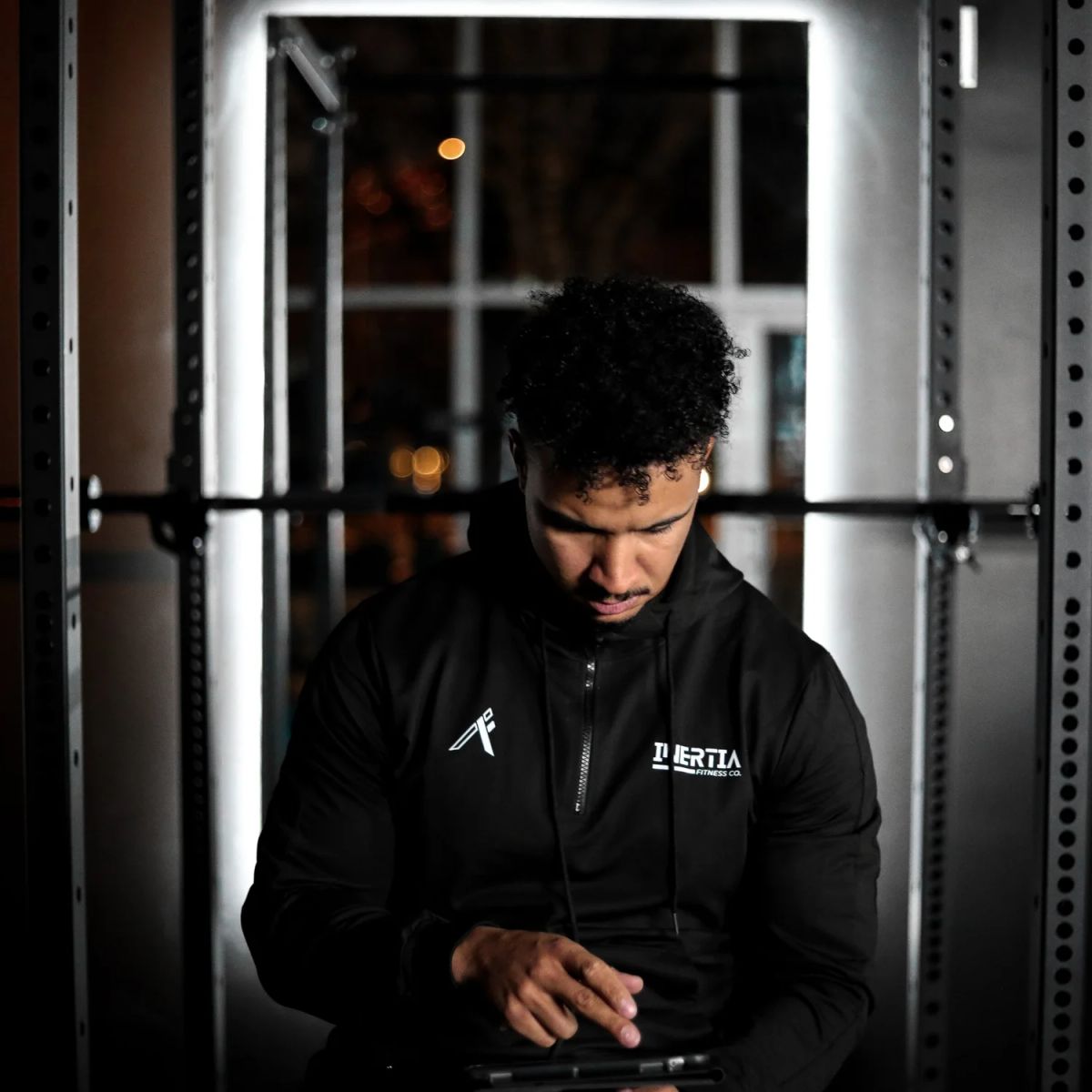 Training under the Inertia Fitness Co. sign at the North Charlotte studio